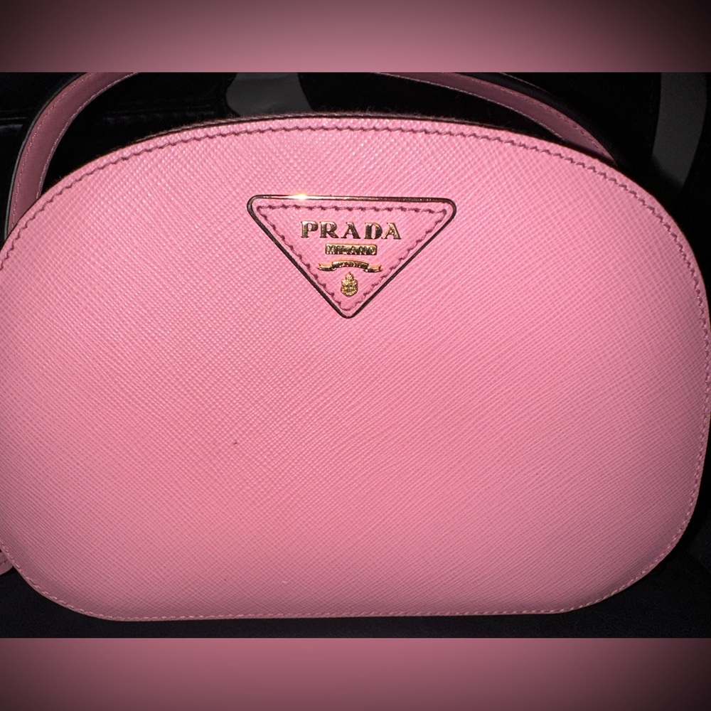 Fairly worn pink Prada bag
